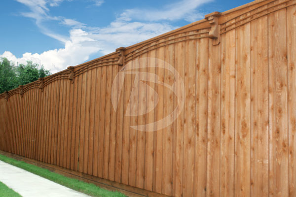 Board on board wood fence with top cap and corbels
