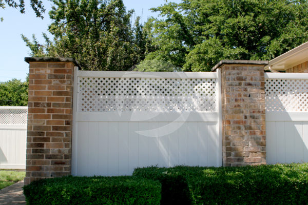 White vinyl decorative panel separated with stone pillar posts