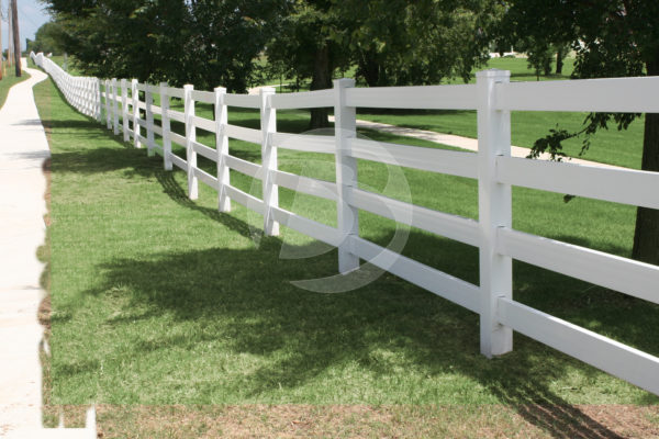White Vinyl fencing surrounding a golf course