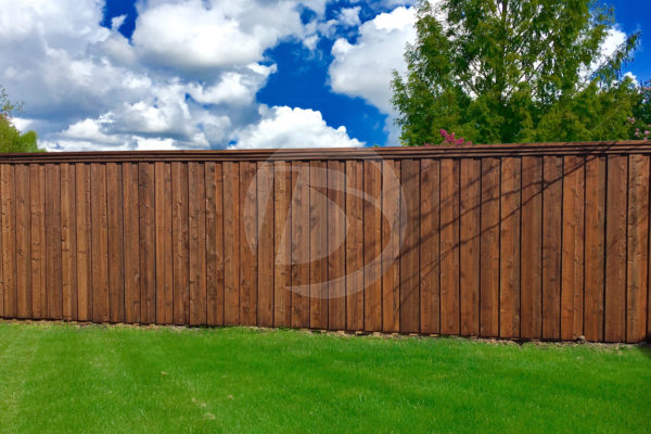 Brown stained wood backyard fence