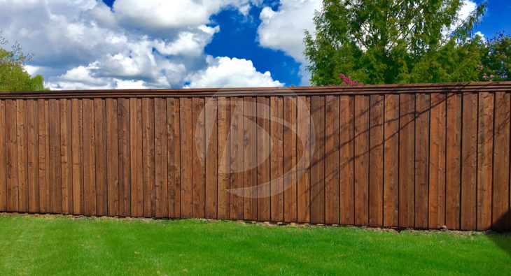 Brown stained wood backyard fence
