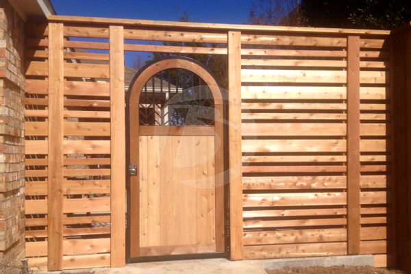 Horizontal Cedar Fence with Spaced Rails and Cedar Arched Door