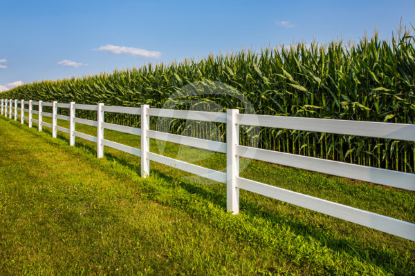 White 3-rail agricultural vinyl fencing