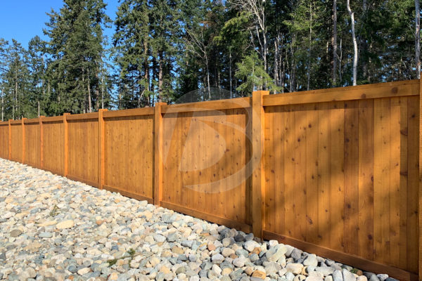 Cedar fence with cedar post 8 foot tall along shoreline