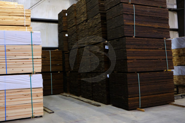 Raw and Stained Wood Pickets in Binford Stain Shop