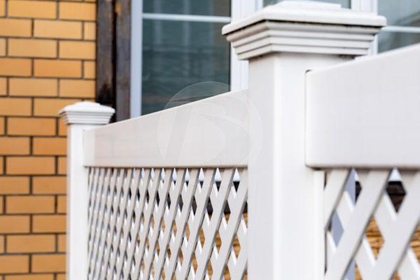 White vinyl posts and caps for fence