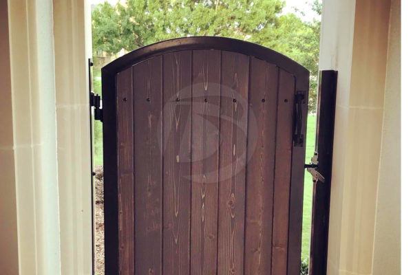Ornamental and stained wood cedar gate with latch